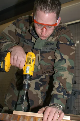 drill: to create (a hole) by removing material with a drill (tool)