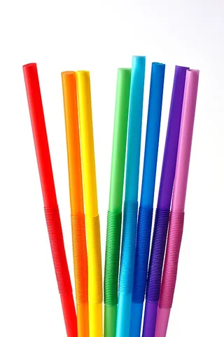 drinking straw: a long tube (usually made out of plastic or paper) through which a beverage is drunk via suction
