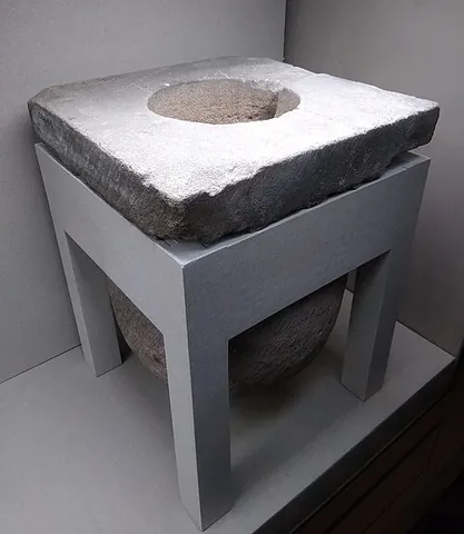 dripstone: a protective moulding over a door or window that allows rain to drip away from the structure
