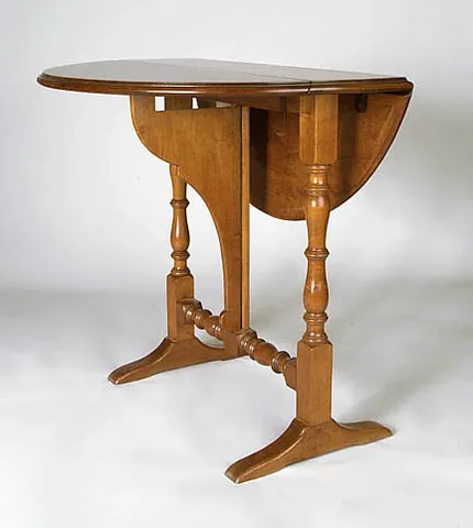 dropleaf: a flat section of a table that can be extended or collapsed