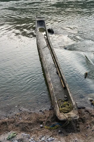 dugout: a canoe made from a hollowed-out log