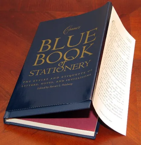 dust jacket: the detachable paper cover of a book; used to protect the binding, and to provide a blurb