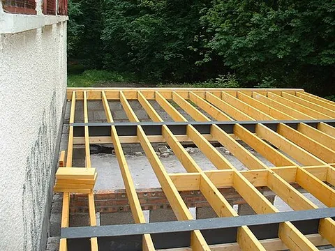 dwang: a horizontal timber (or steel) section used in the construction of a building