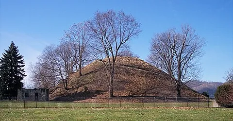 earthen mound: a type of mound; a natural elevation appearing as if thrown up artificially; a regular and isolated...