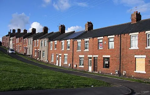 easington colliery: a coastal village and civil parish in County Durham, England, built to house coal miners and their...