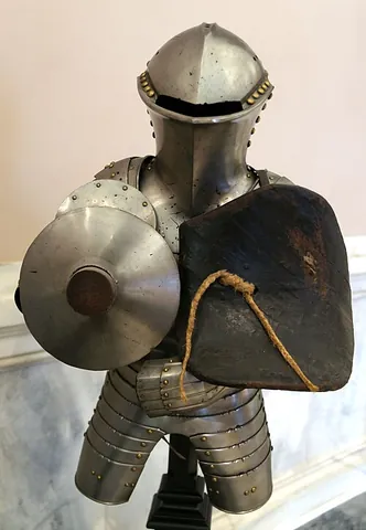 ecranche: a type of shield, used in jousting, which had an indentation or notch to hold the lance