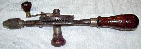 eggbeater drill: a hand drill driven by a manual crank