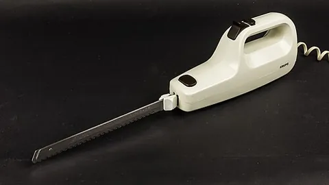 electric carving knife: an electrical device with two serrated blades that move with a sawing action, used for slicing food