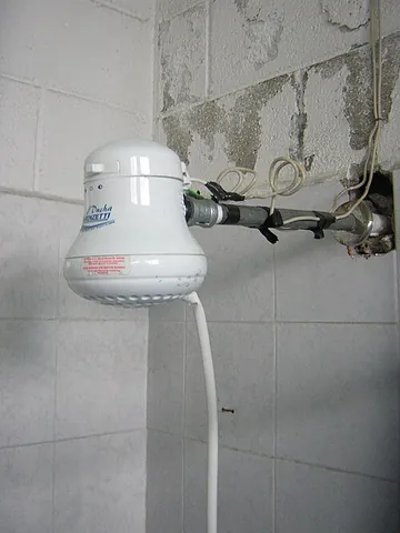 electric shower: a shower that heats water immediately before it is expelled, rather than drawing hot water from a...