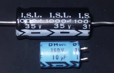 electrolytic capacitor: a capacitor that uses an electrolyte as one of its capacitative plates