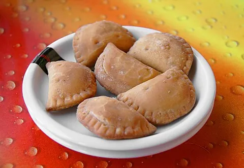 empanada: any of a variety of stuffed pastries found in Spanish, Filipino, and Latin American cuisine