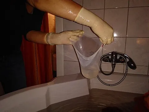 en caul: of a birth: with the baby still inside an intact amniotic sac