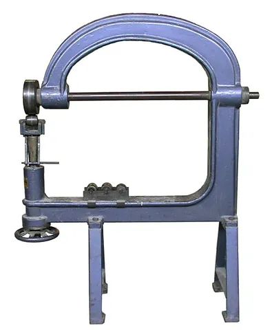 english wheel: a manually-operated metalworking apparatus used to form smooth, compound curves from flat sheets of...