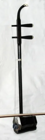 erhu: a type of bowed spike fiddle having two strings, originating in China as part of the huqin family...