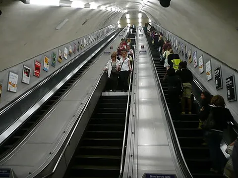 escalator barrel: a sharply inclined shaft or tunnel in which escalators are installed underground, particularly at...