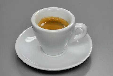 espresso: a concentrated coffee beverage brewed by forcing hot water under high pressure through finely...
