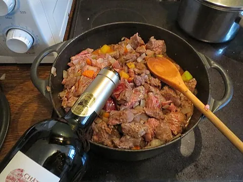 estouffade: a Southern French stew of meat added to a base of onion, garlic, tomato, etc., fried in oil and...