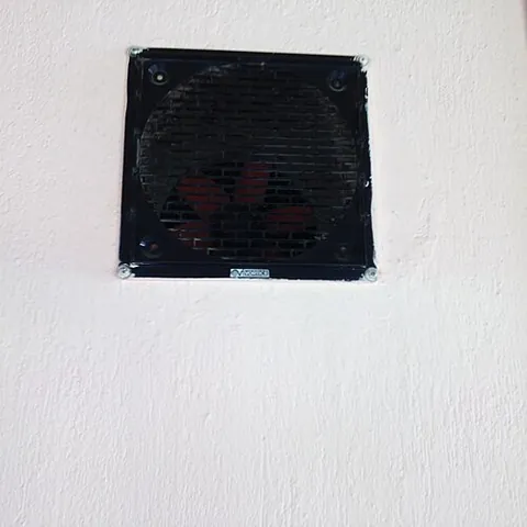extractor fan: a type of fan designed to remove moisture from a room, or dust or fumes from certain environments