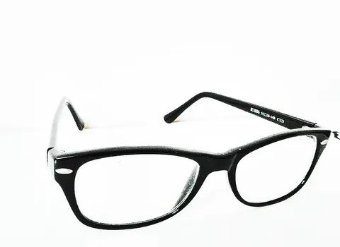 eyeglass: an artificial lens, especially one of a pair