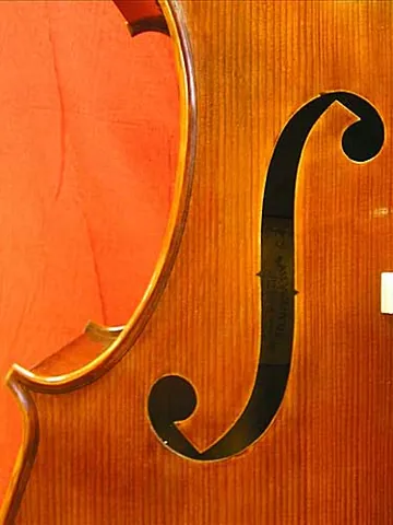 f-hole: a sound hole, shaped like a lowercase f, through the top surface of a string instrument