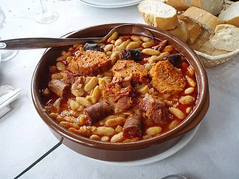 fabada: a dish from Asturias, made of white beans, pork products, chorizo and various other ingredients