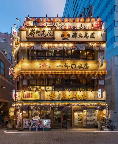 facade: the face of a building, especially the front view or elevation