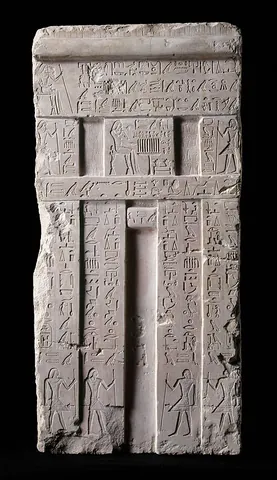 false door: a recessed carving on an Ancient Egyptian tomb wall representing a palace façade with a door at its...