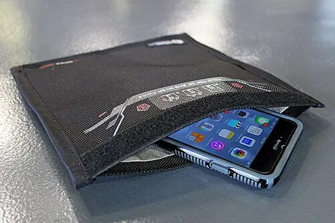 faraday bag: a bag made of a material that blocks electromagnetic signals, and employing special sewing...