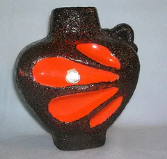 fat lava: a style of gaudy, vibrant, pottery decoration, common in West Germany from the 1950s to the 1970s
