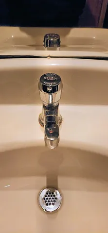 faucet: an exposed plumbing fitting; a tap or spigot; a regulator for controlling the flow of a liquid from...