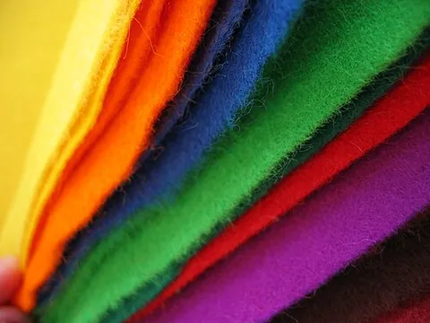 felt: a cloth or stuff made of matted fibres of wool, or wool and fur, fulled or wrought into a compact...