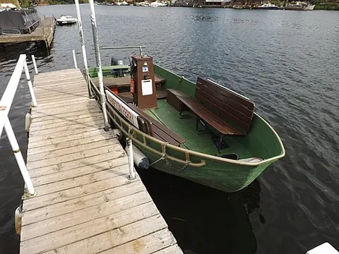 ferryboat: a boat used to ferry passengers, vehicles, or goods across open water, especially one that runs to...