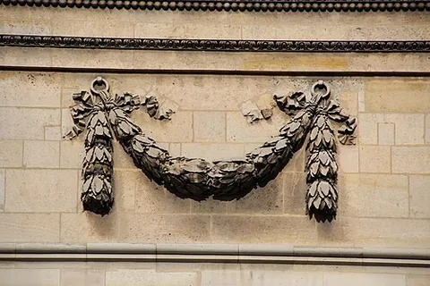 festoon: an ornament such as a garland or chain which hangs loosely from two tacked spots