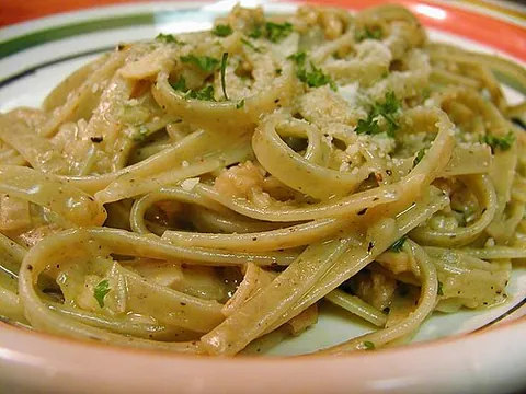 fettuccini: a long, broad, thick noodle; a type of pasta having this shape
