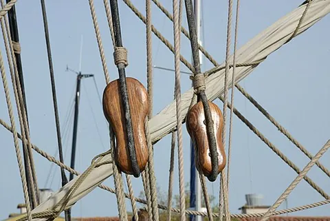 fiddle block: a long tackle block having two sheaves of different diameters in the same plane, instead of side by...