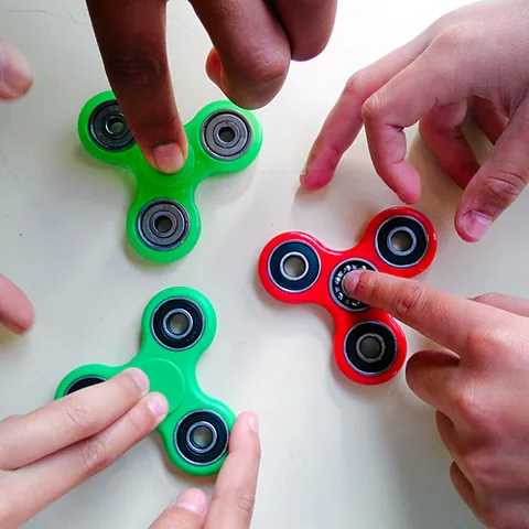 fidget toy: a toy or other object intended to be aimlessly manipulated with the hands, in order to provide a...