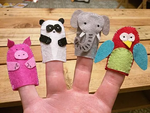 finger puppet: a small puppet manipulated from the inside by the puppeteer's fingers