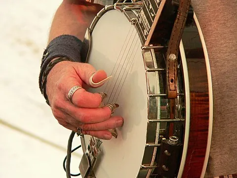 fingerpick: a type of plectrum that clips on to, or wraps around the end of the fingers and thumb