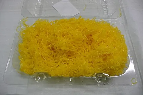 fios de ovos: a traditional Portuguese sweet food made of eggs (chiefly yolks), drawn into thin strands and...