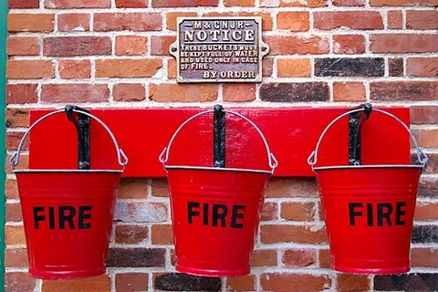 fire bucket: a bucket holding water or sand, etc., used to extinguish fires
