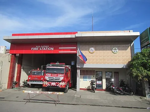 fire station: the building where firefighters and fire trucks/fire engines are housed when not answering an alarm