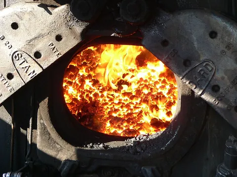 firebox: the chamber of a steam engine, or a steam locomotive, in which the fuel is burned