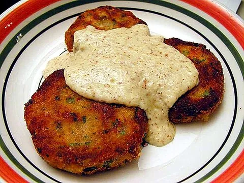 fishcake: a mixture of flaked fish, mashed potato or another starch, and seasoning, made into a patty and...