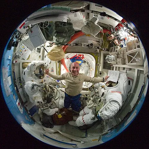 fisheye lens: a wide-angle lens having an extremely wide field of view (approaching or exceeding 180 degrees) and...