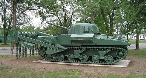 flail tank: a type of armored tracked fighting vehicle with a motorized spinning drum with the longitudinal...