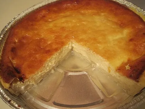 flan: a baked tart with a sweet or savoury filling in an open-topped pastry case