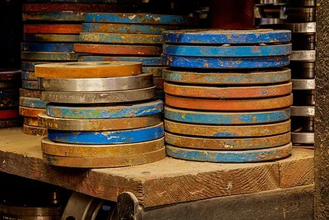 flange: an external or internal rib or rim, used either to add strength or to hold something in place