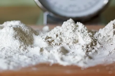 flour: powder obtained by grinding or milling cereal grains, especially wheat, or other foodstuffs such as...