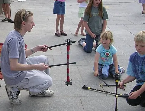 flower sticks: a set of two hand sticks and a third, softer, high-grip flower stick used for juggling