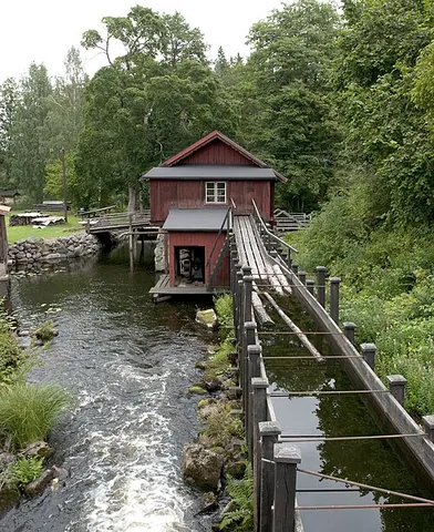 flume: a ravine or gorge, usually one with water running through